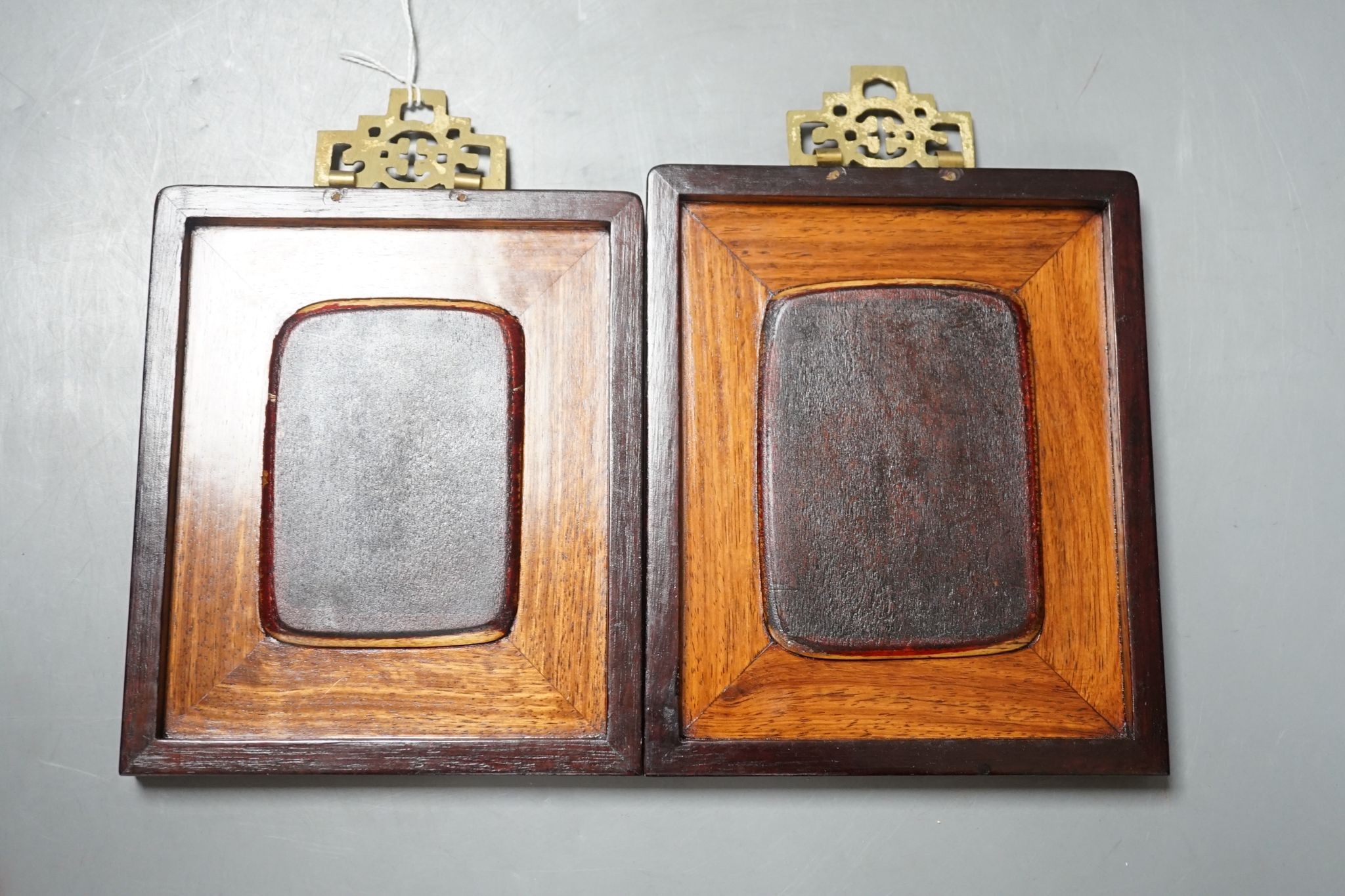 A pair of Chinese framed blue and white tiles, total size 16 cm X 13.5 cm